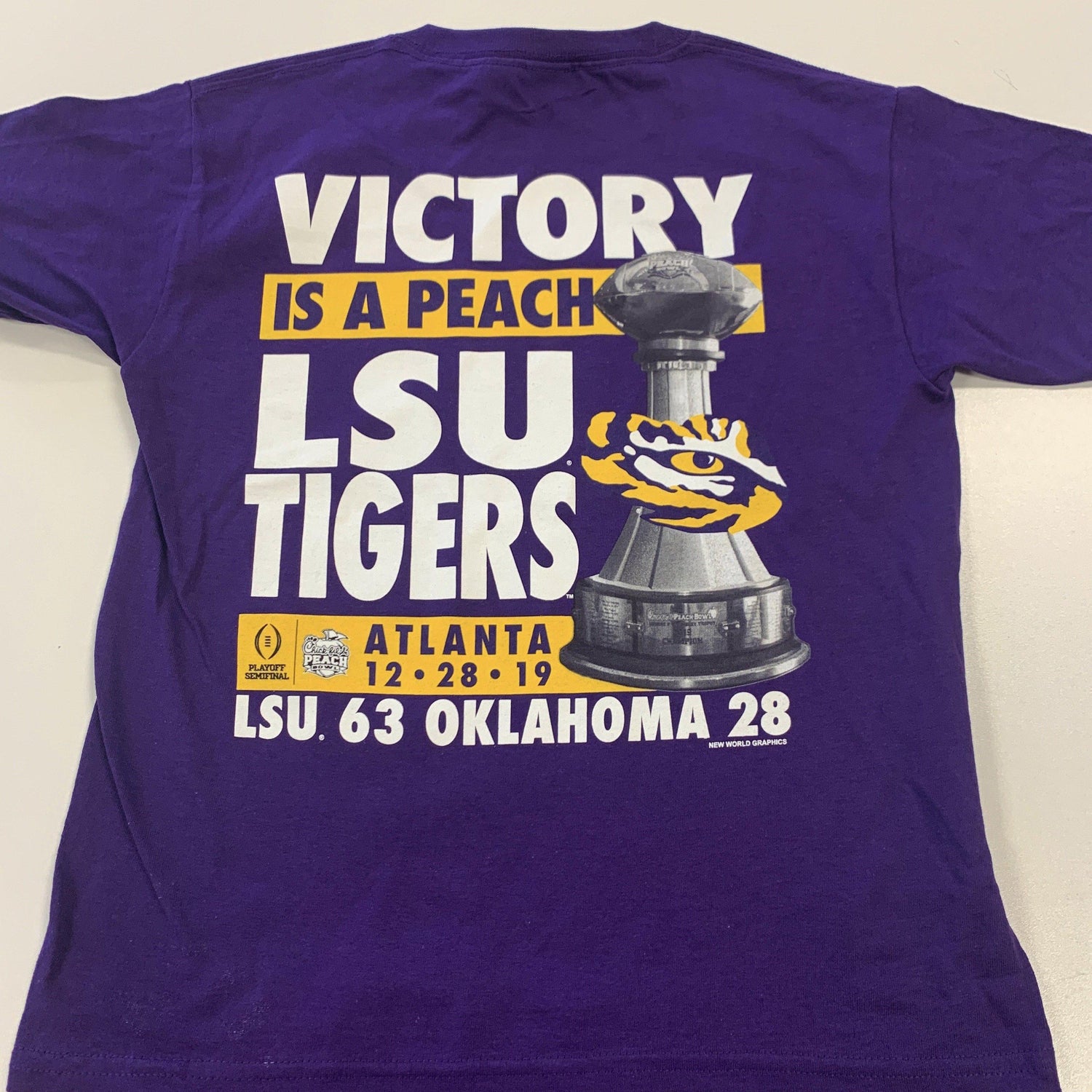 LSU Victory is a Peach Shirt - Purple